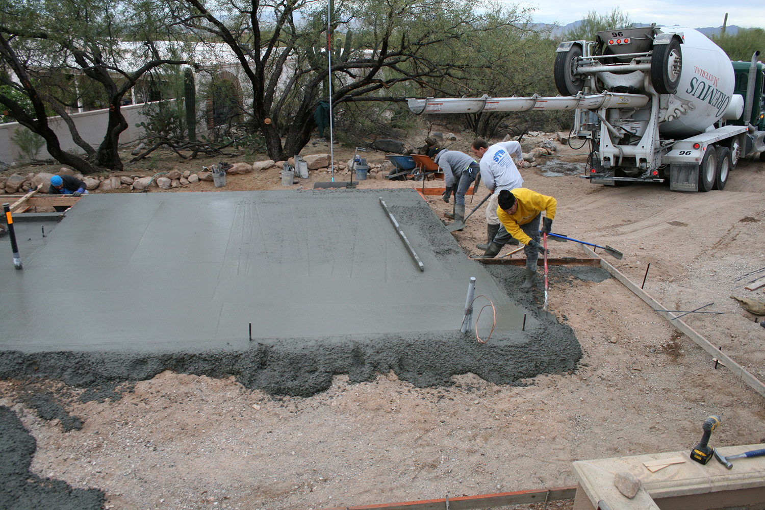 construction crew laying cement image